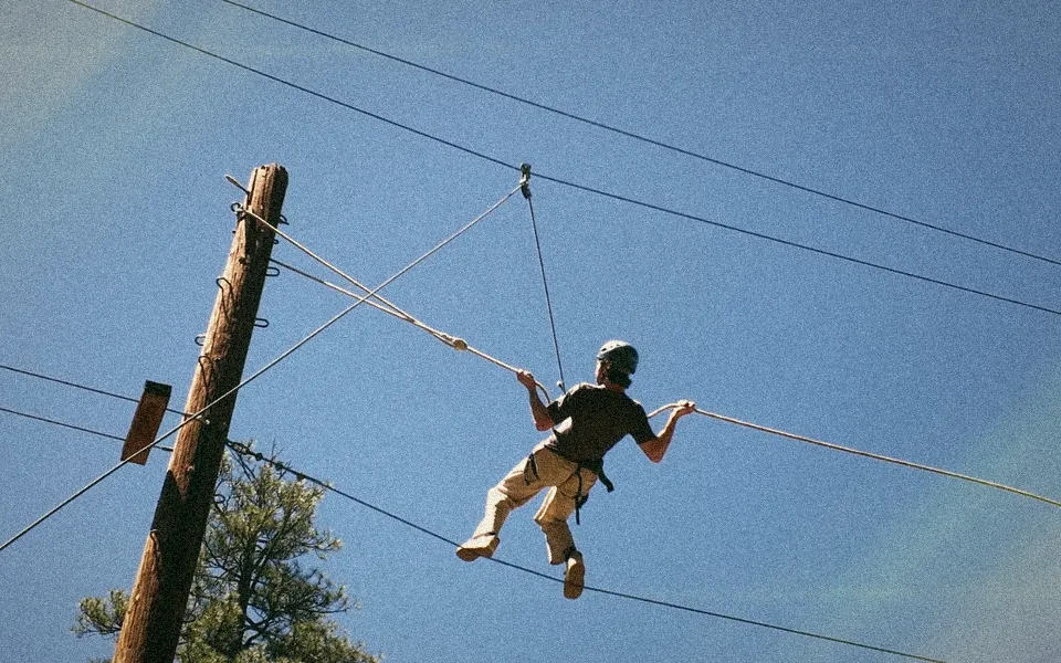 Campers on the ropes course at YMCA Camp Arbolado